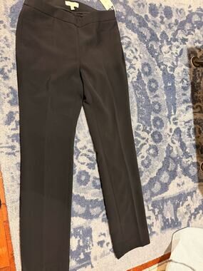 Etetera Black Pants. NWT- size 8. Zipper and fastener and elastic waist.